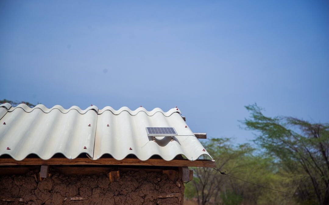 Solar panel on rooftop in Africa — clean energy access for remote communities in Ghana and West Africa
